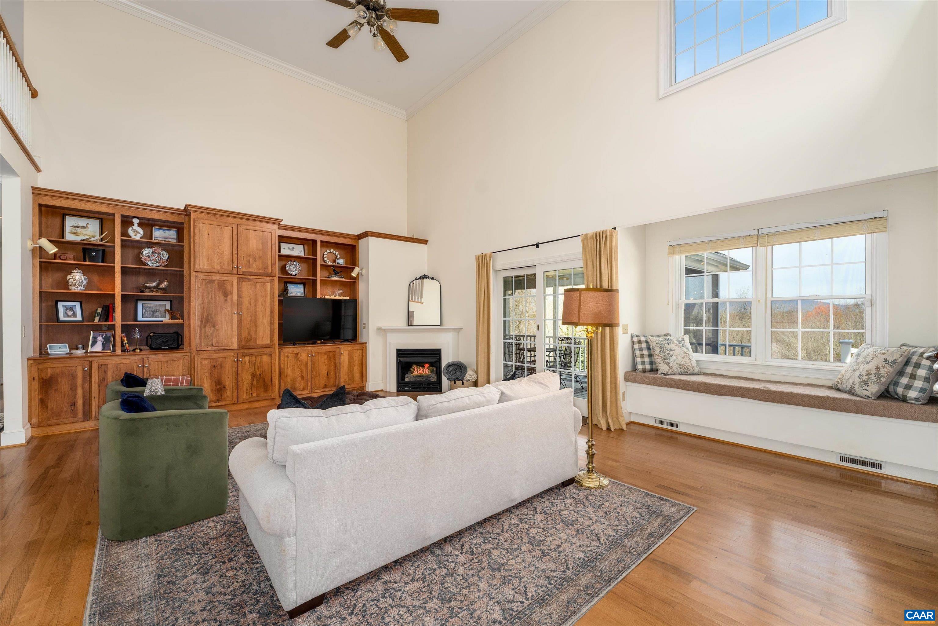 4444 Woods Edge Road Troy, VA 22974 - Photo 13 of 74 a living room with furniture fireplace and rug floor