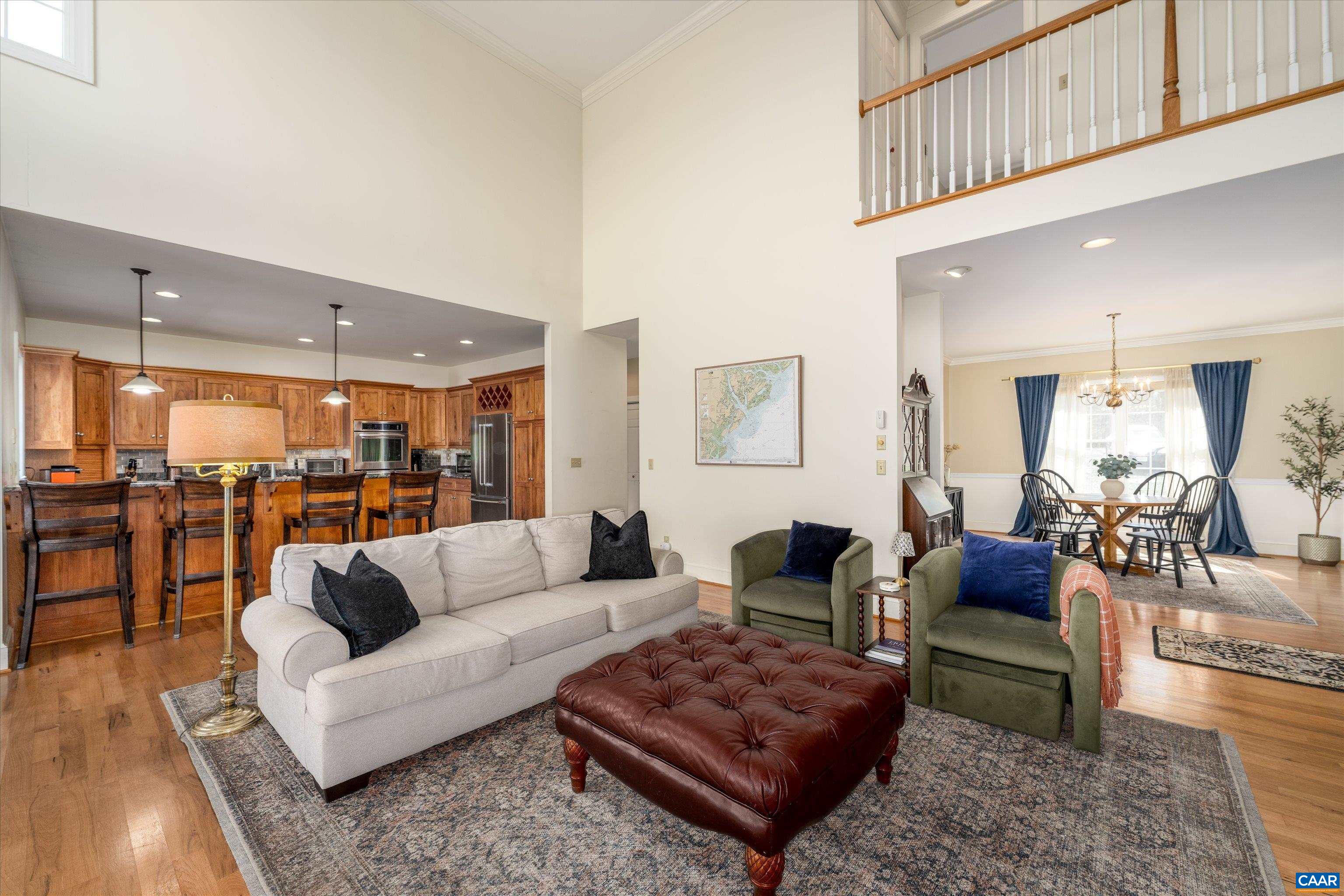 4444 Woods Edge Road Troy, VA 22974 - Photo 16 of 74 a living room with furniture and view of kitchen