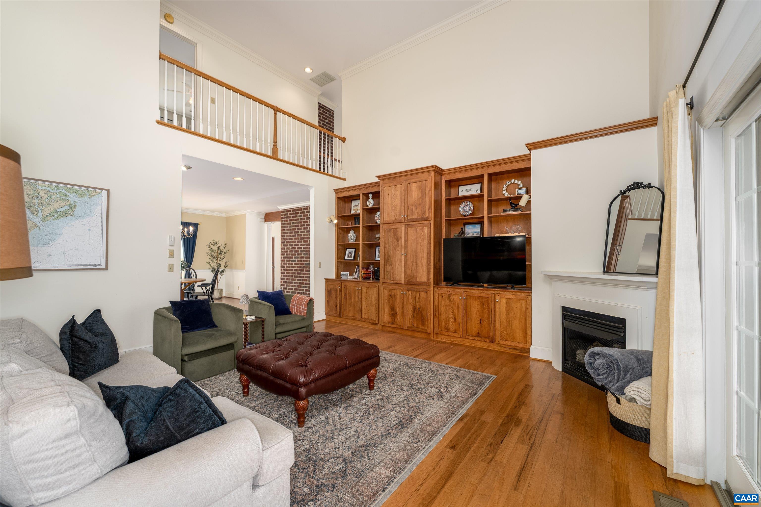 4444 Woods Edge Road Troy, VA 22974 - Photo 17 of 74 a living room with furniture and a fireplace