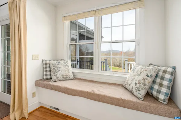a kitchen with stainless steel appliances granite countertop a sink a stove and cabinets