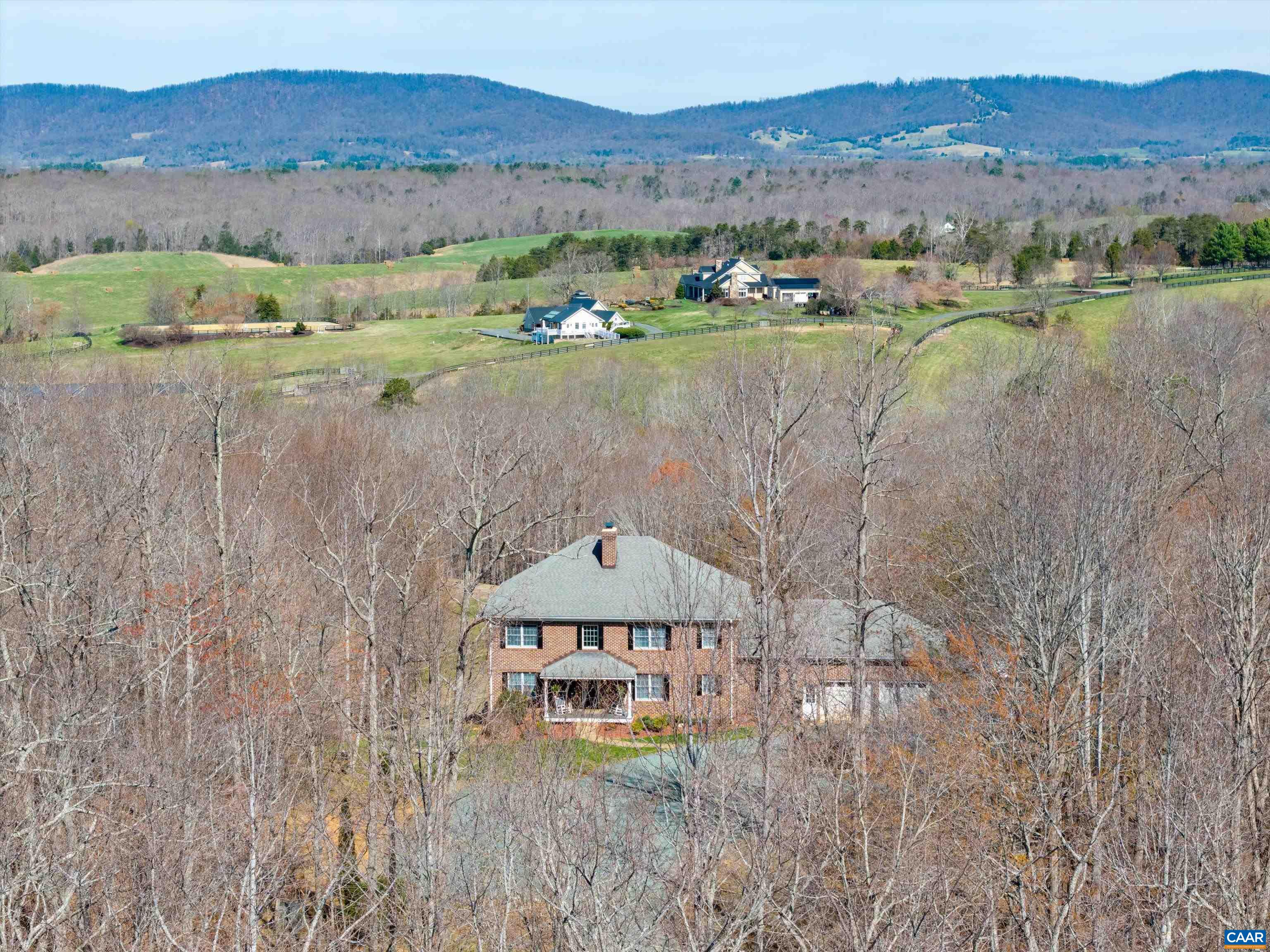4444 Woods Edge Road Troy, VA 22974 - Photo 2 of 74 a view of a lake with a mountain