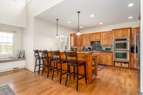a workspace with furniture and a window