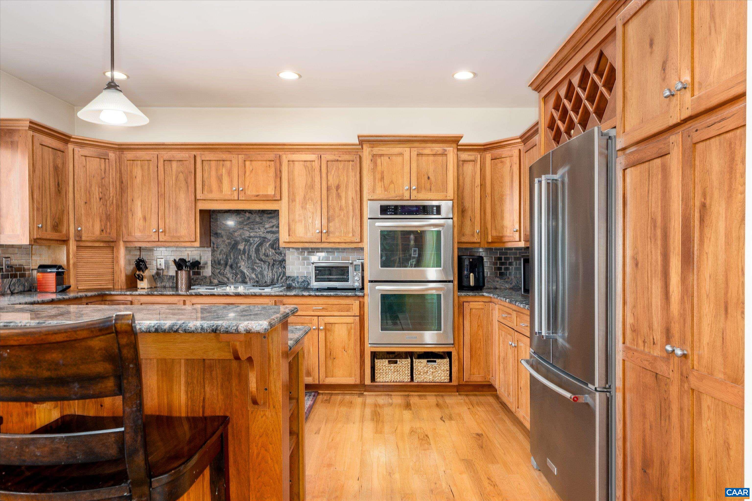 4444 Woods Edge Road Troy, VA 22974 - Photo 25 of 74 a kitchen with stainless steel appliances granite countertop a refrigerator and a stove top oven