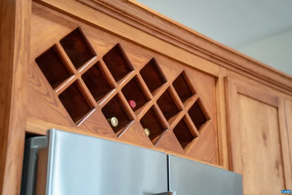 a spacious bathroom with a tub sink and mirror