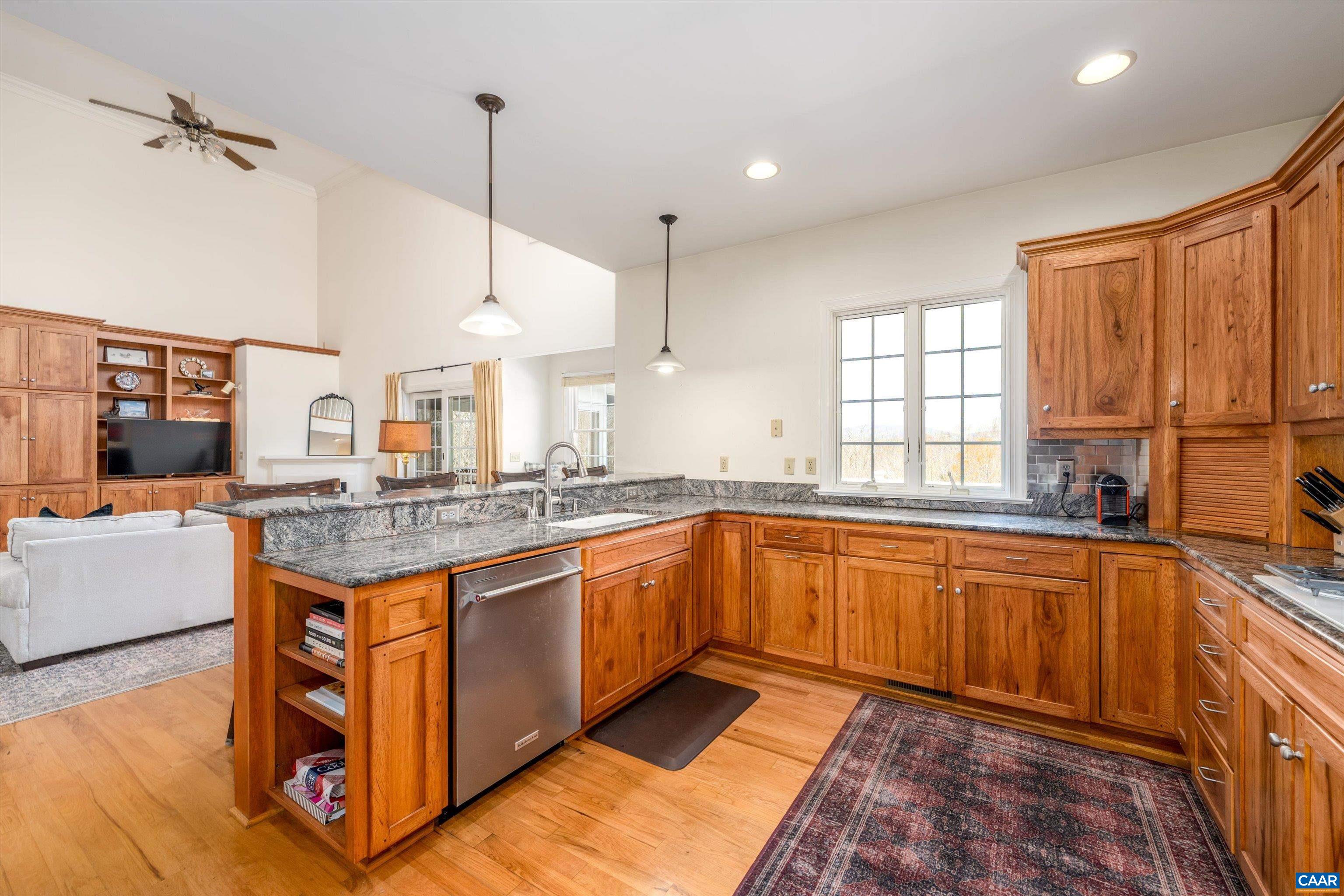 4444 Woods Edge Road Troy, VA 22974 - Photo 31 of 74 a kitchen with stainless steel appliances granite countertop a stove and a sink