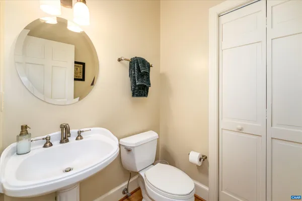 a view of a livingroom with a ceiling fan and window