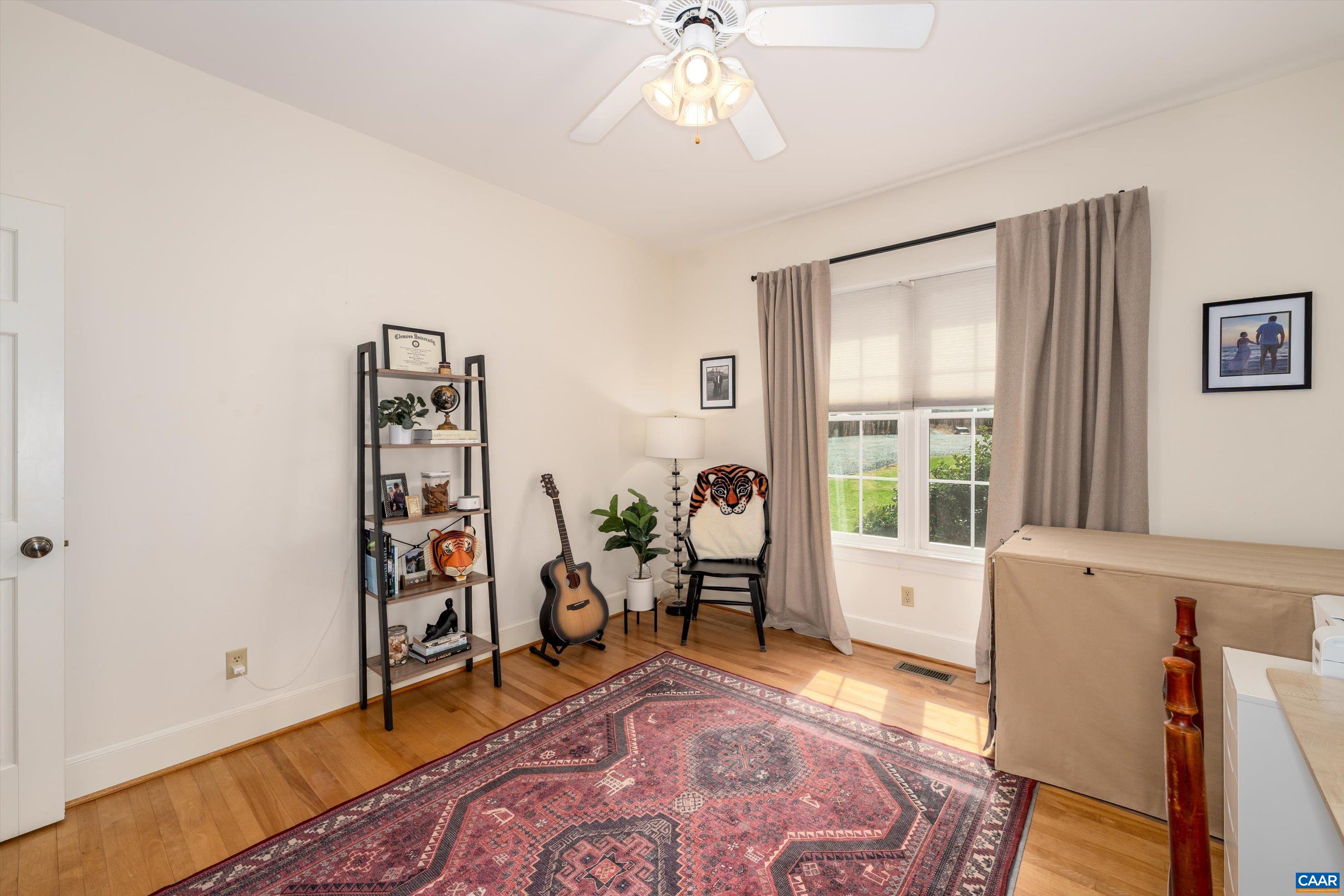 4444 Woods Edge Road Troy, VA 22974 - Photo 36 of 74 a living room with furniture and a window