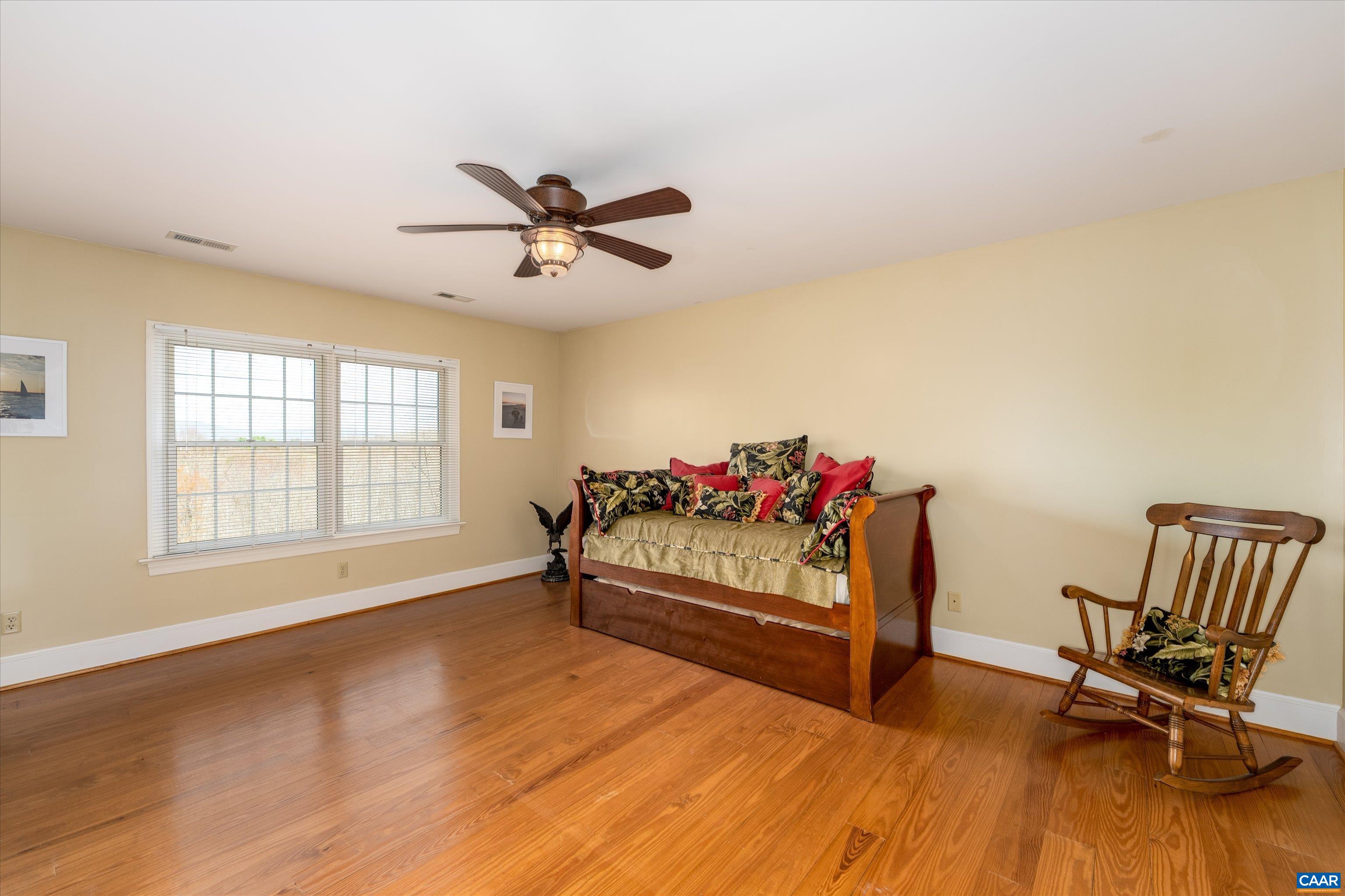 4444 Woods Edge Road Troy, VA 22974 - Photo 46 of 74 a bedroom with furniture and a window