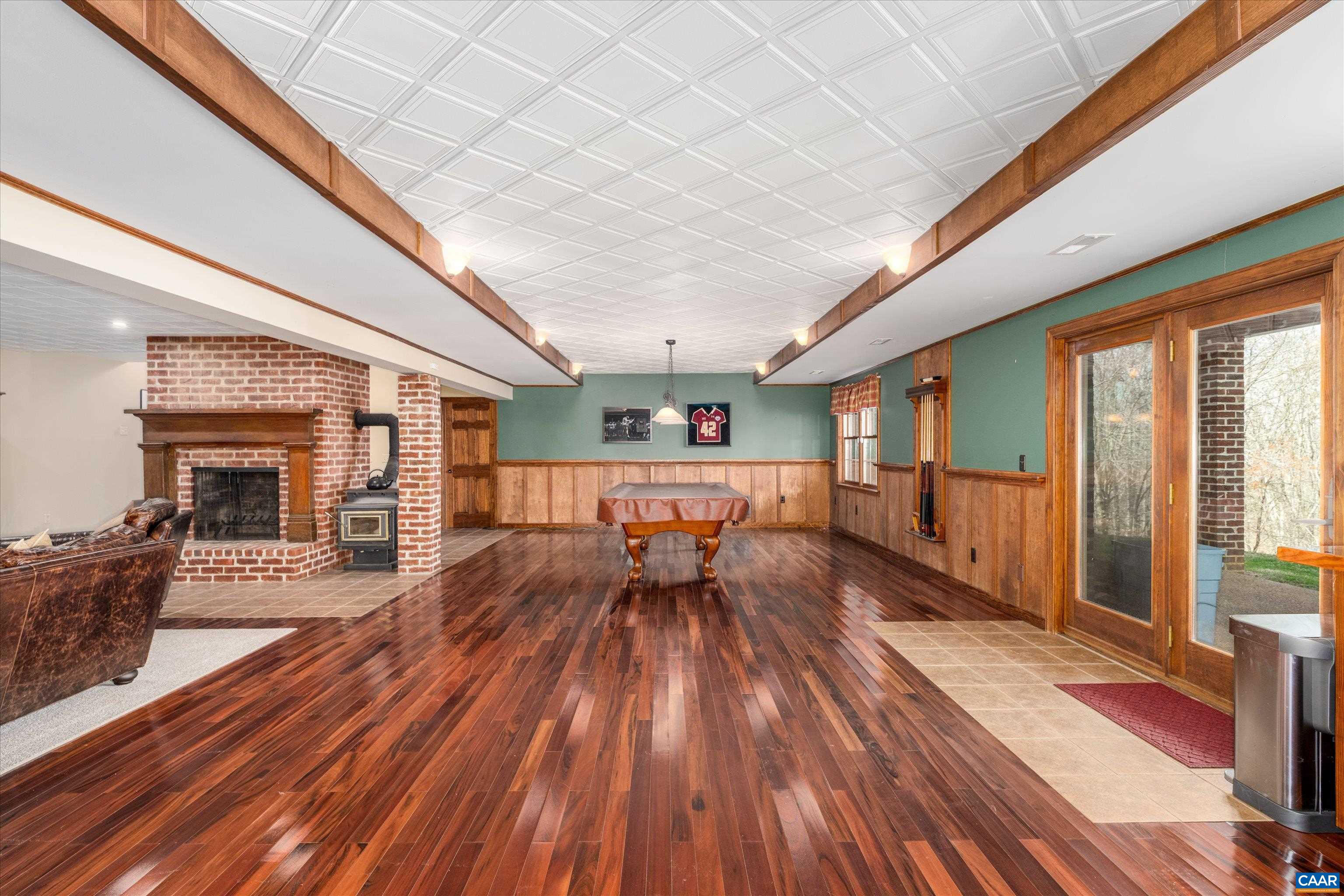 4444 Woods Edge Road Troy, VA 22974 - Photo 61 of 74 a living room with furniture and a wooden floor