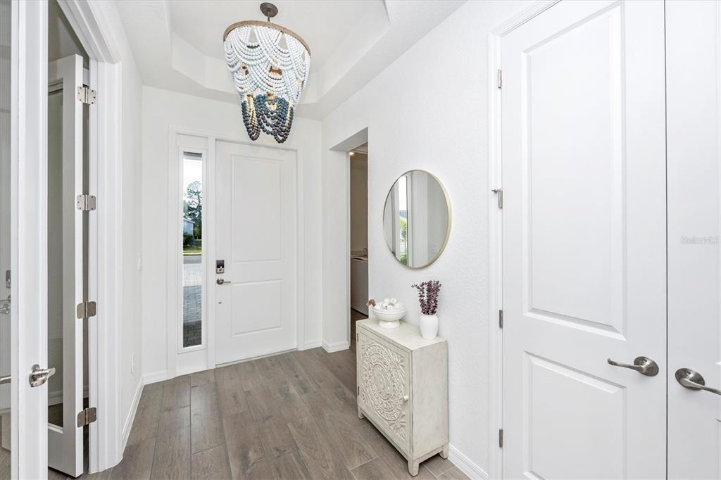 12950 Tulum Loop Venice, FL 34293 - Photo 3 of 98 a view of a hallway with elevator