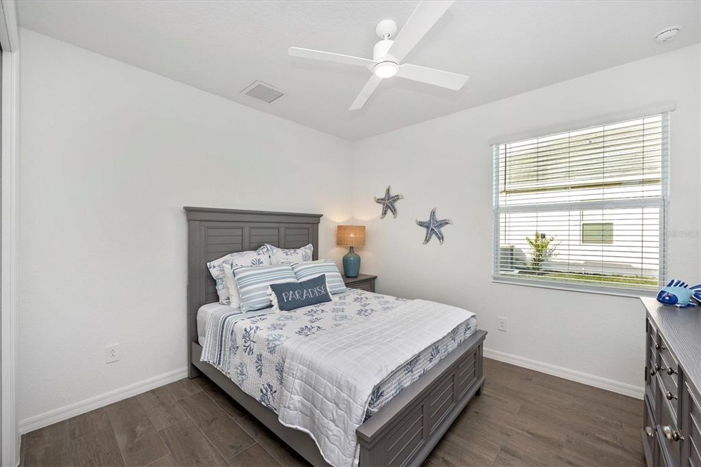 12950 Tulum Loop Venice, FL 34293 - Photo 35 of 98 a bedroom with a bed and a window