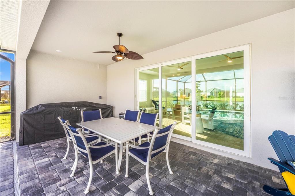 12950 Tulum Loop Venice, FL 34293 - Photo 50 of 98 a view of a dining room with furniture window and outside view
