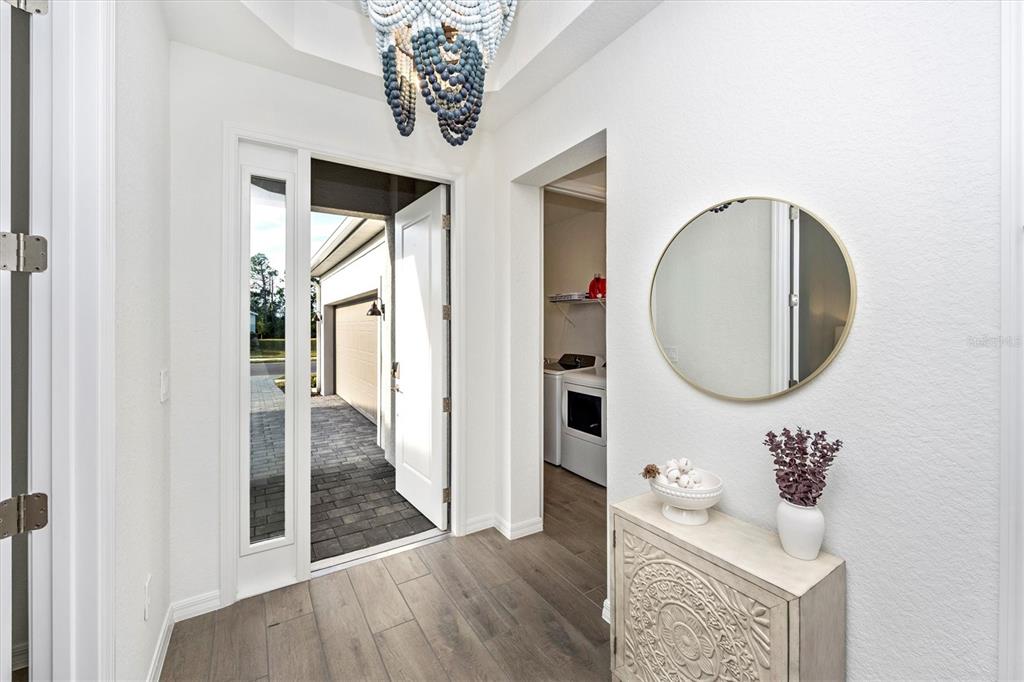 12950 Tulum Loop Venice, FL 34293 - Photo 5 of 98 a bathroom with a sink and a mirror