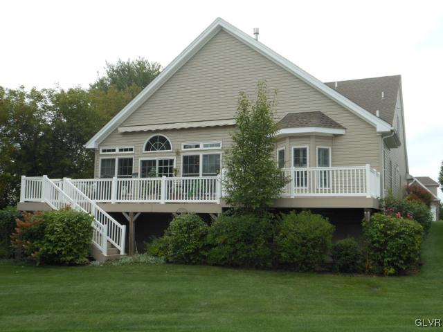 48 Inverness Lane Easton, PA 18045 - Photo 2 of 28 a front view of a house with a garden