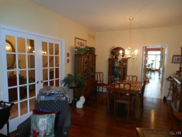 48 Inverness Lane Easton, PA 18045 - Photo 7 of 28 a view of a livingroom with furniture wooden floor and fan