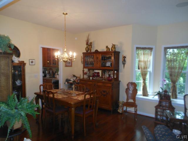 48 Inverness Lane Easton, PA 18045 - Photo 8 of 28 a view of a dining room with furniture window and wooden floor