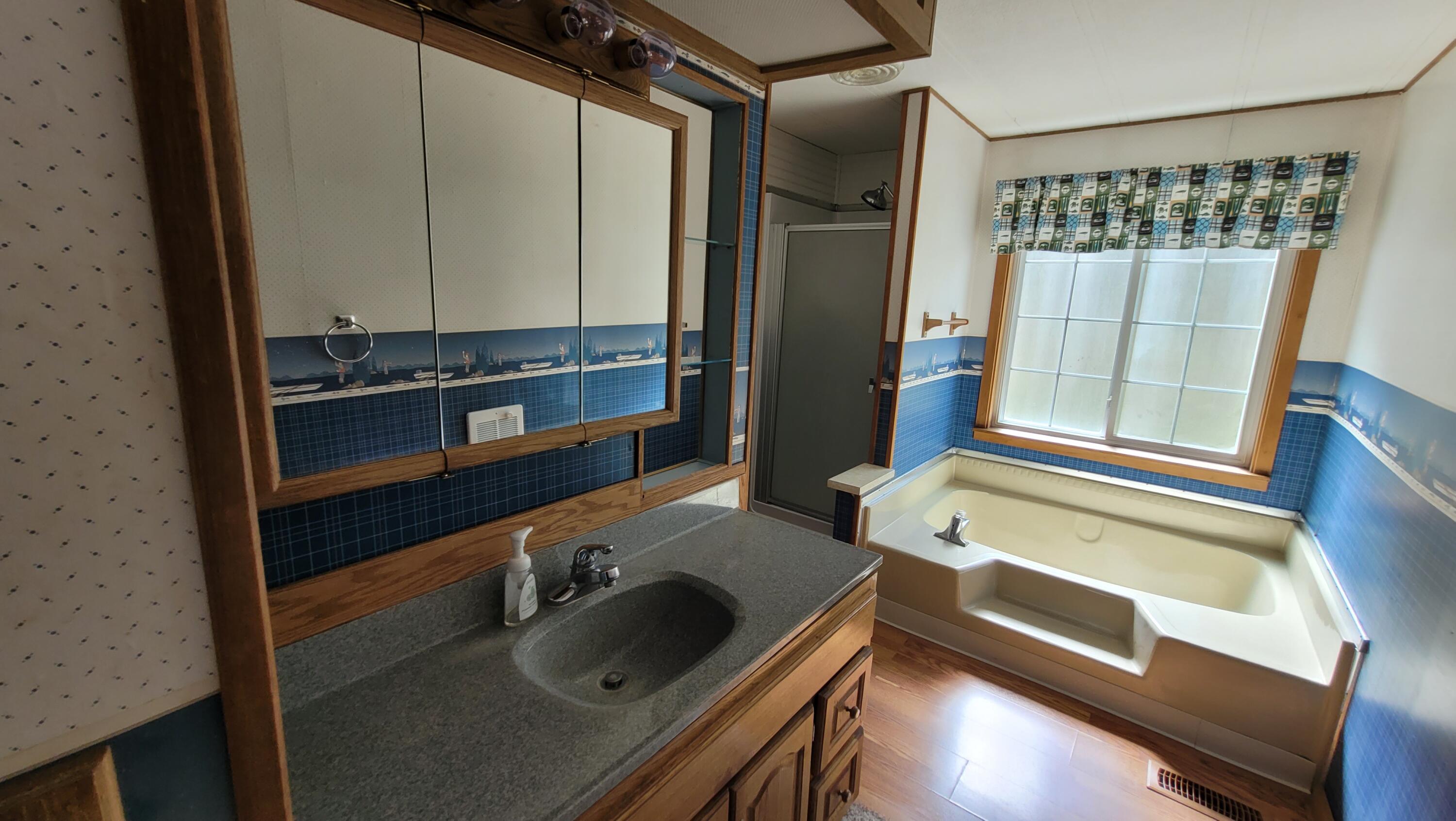 19724 Buck Canyon Road Bend, OR 97702 - Photo 24 of 38 Master bathroom.