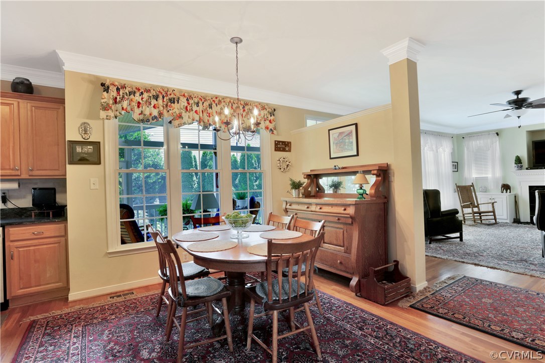1201 Goswick Ridge Road Midlothian, VA 23114 - Photo 13 of 32 a view of a dining room with furniture window and outside view
