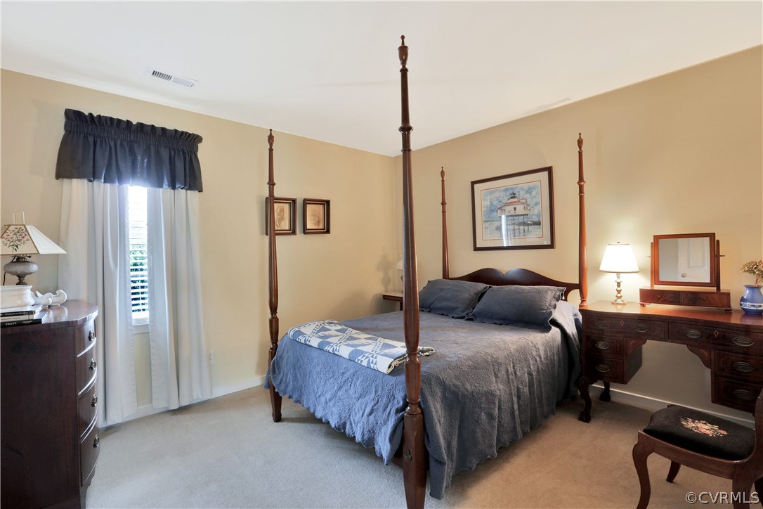 1201 Goswick Ridge Road Midlothian, VA 23114 - Photo 18 of 32 a bedroom with a bed window and wall painting