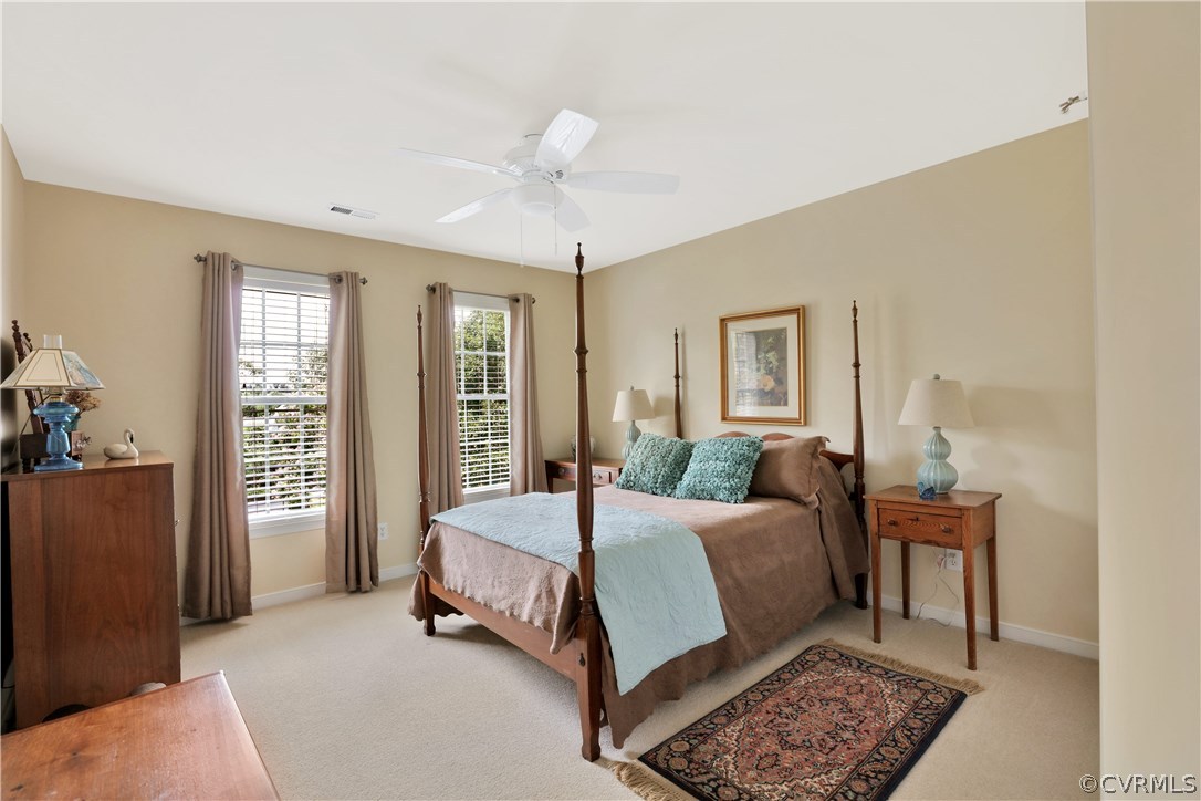 1201 Goswick Ridge Road Midlothian, VA 23114 - Photo 20 of 32 a bed room with a bed and wooden floor