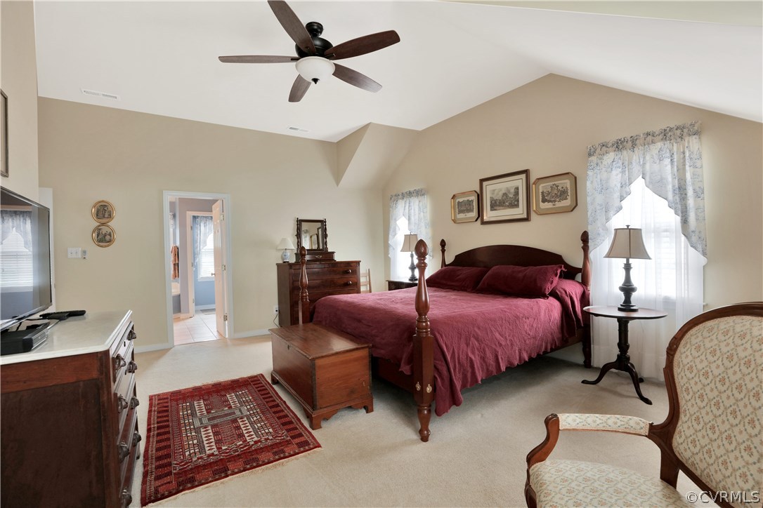 1201 Goswick Ridge Road Midlothian, VA 23114 - Photo 24 of 32 a spacious bedroom with a bed a window and dresser