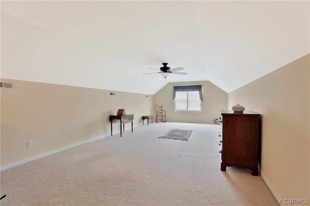 1201 Goswick Ridge Road Midlothian, VA 23114 - Photo 26 of 32 a living room with furniture and a table