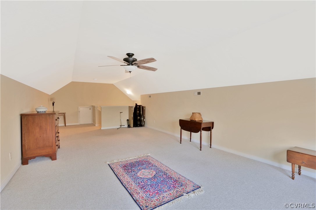 1201 Goswick Ridge Road Midlothian, VA 23114 - Photo 27 of 32 a living room with furniture and a chandelier
