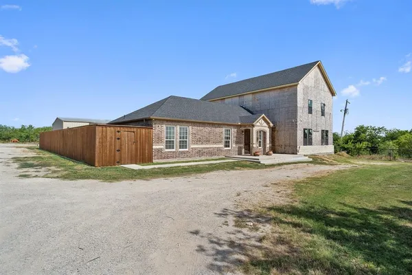 a house view with a outdoor space