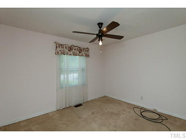 2468 Milburnie Road Raleigh, NC 27610 - Photo 14 of 25 One of 3 bedrooms, all have ceiling fans. Bedroom