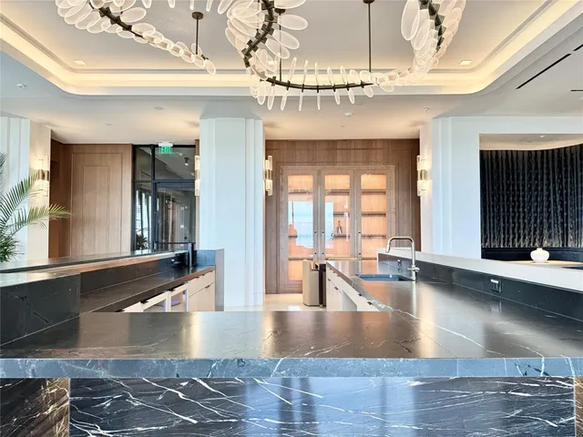 a view of a living room with a large window