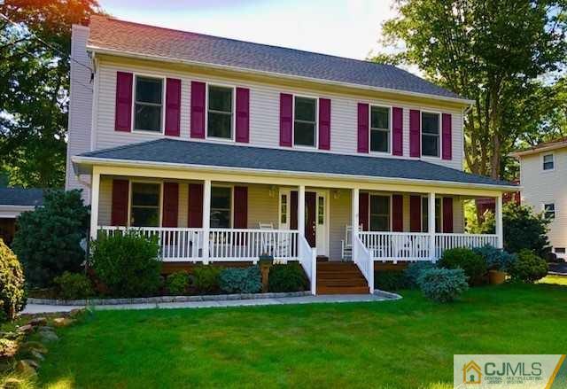 36 Ferris Road Edison, NJ 08817 - Photo 1 of 22 a front view of a house with a yard