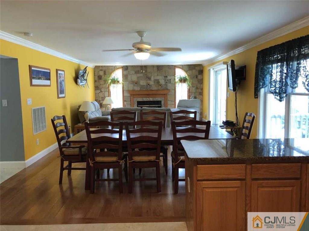 36 Ferris Road Edison, NJ 08817 - Photo 4 of 22 a view of a dining room with furniture window and wooden floor