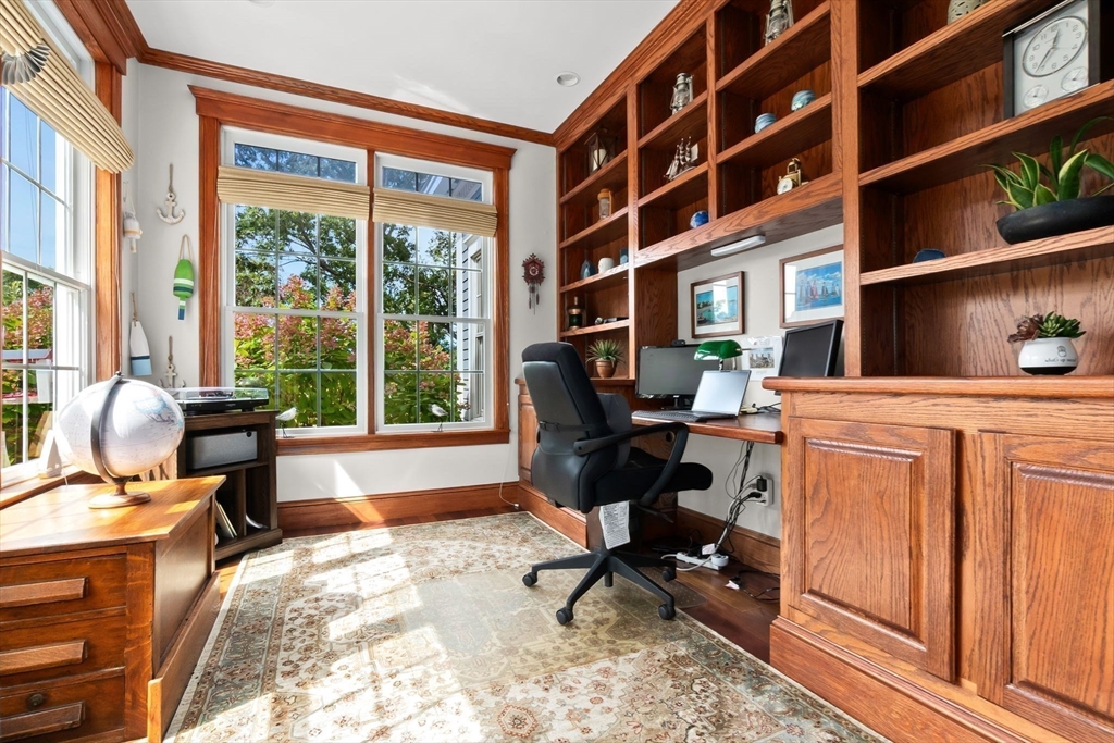 24 Old Rowley Road Newbury, MA 01951 - Photo 20 of 42 a work room with furniture bookshelf and a window