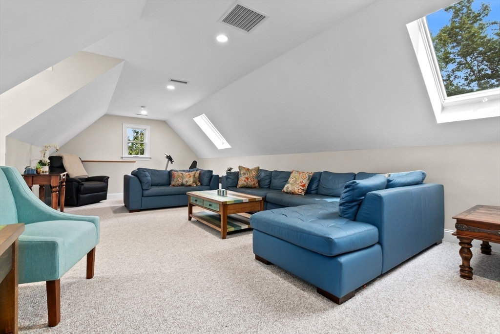 24 Old Rowley Road Newbury, MA 01951 - Photo 29 of 42 a living room with furniture and a large window