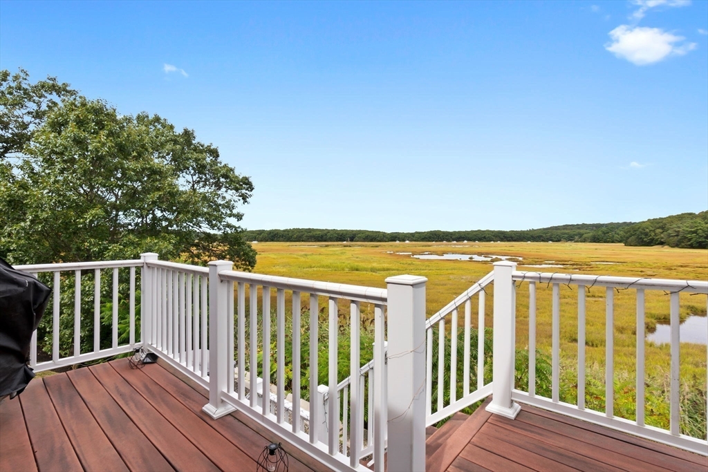 24 Old Rowley Road Newbury, MA 01951 - Photo 3 of 42 a view of wooden balcony with ocean view
