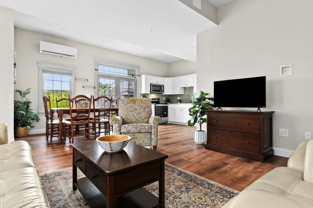 24 Old Rowley Road Newbury, MA 01951 - Photo 33 of 42 a living room with furniture and a flat screen tv