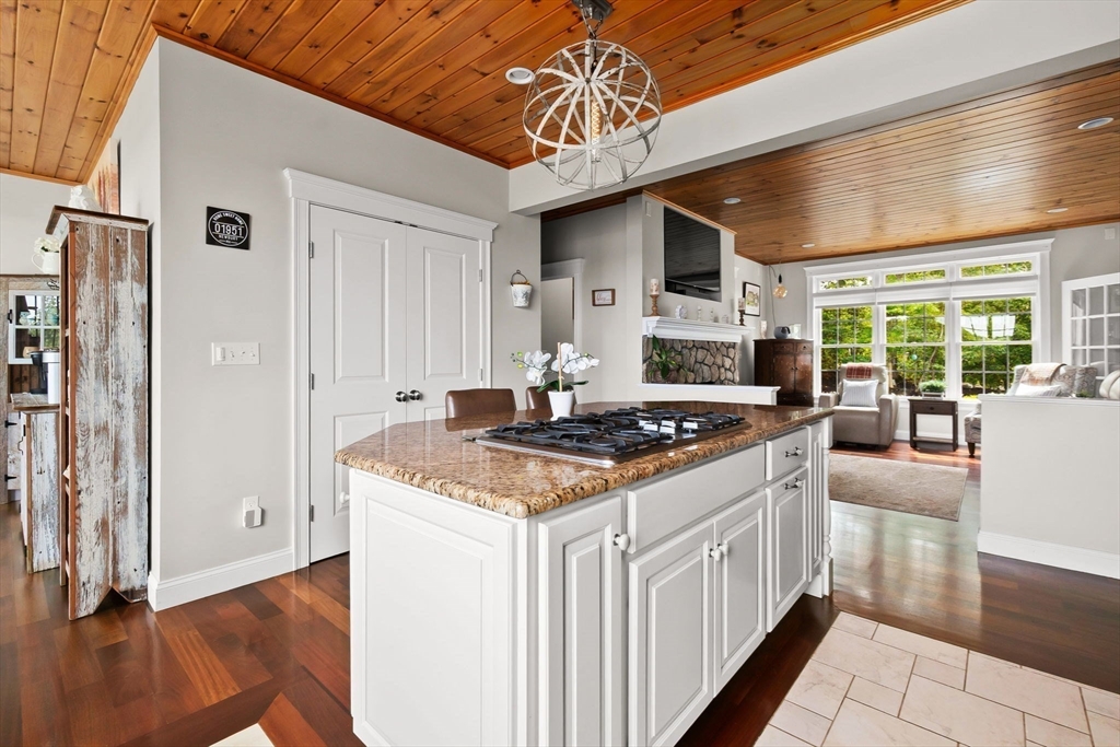 24 Old Rowley Road Newbury, MA 01951 - Photo 8 of 42 a kitchen that has a stove and white cabinets