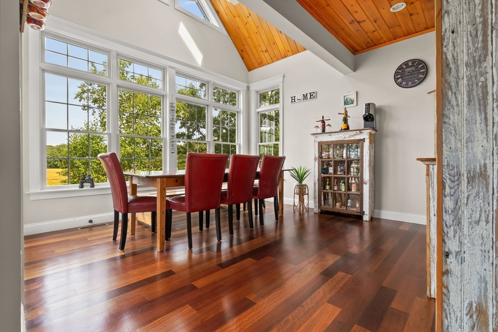 24 Old Rowley Road Newbury, MA 01951 - Photo 10 of 42 a view of a dining room with furniture and wooden floor