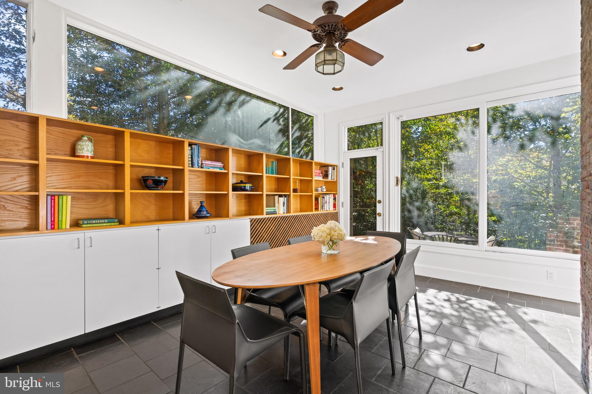 3214 Newark Street Northwest Washington, DC 20008 - Photo 11 of 38 a view of a dining room with furniture window and outside view