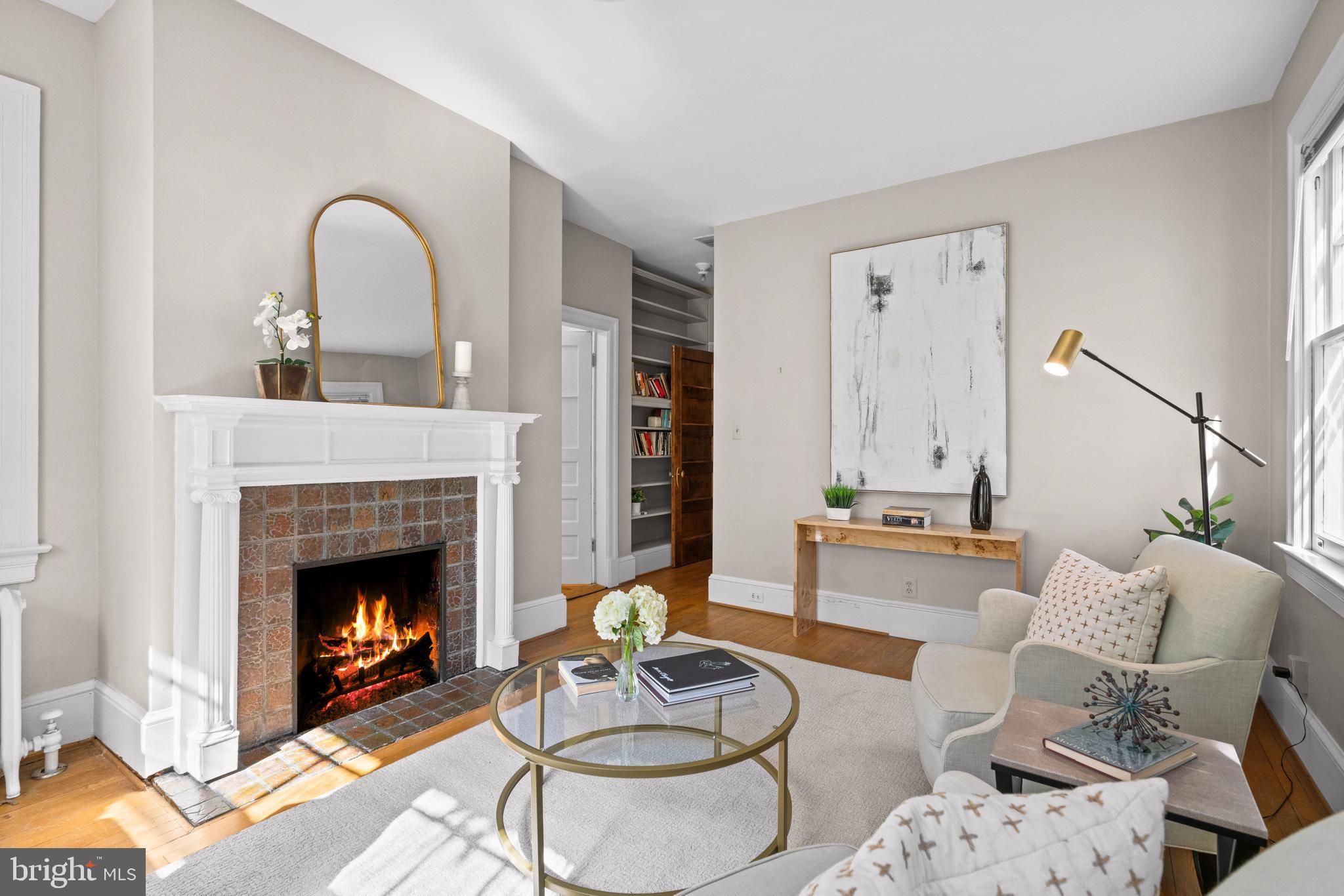 3214 Newark Street Northwest Washington, DC 20008 - Photo 17 of 38 a living room with furniture and a fireplace