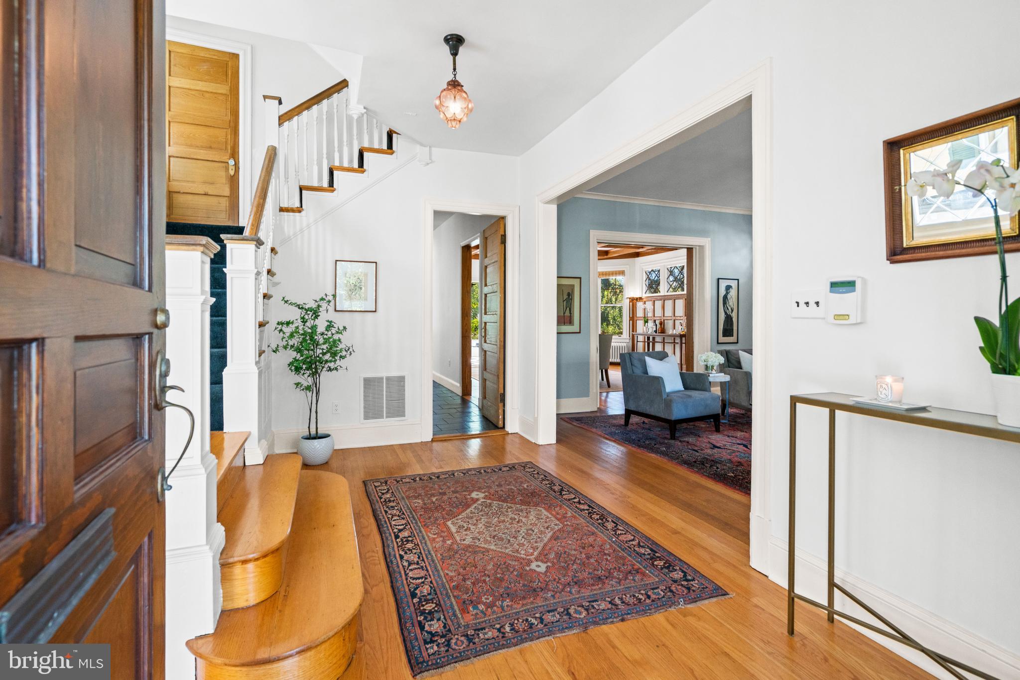 3214 Newark Street Northwest Washington, DC 20008 - Photo 3 of 38 a very nice looking living room with a large bed