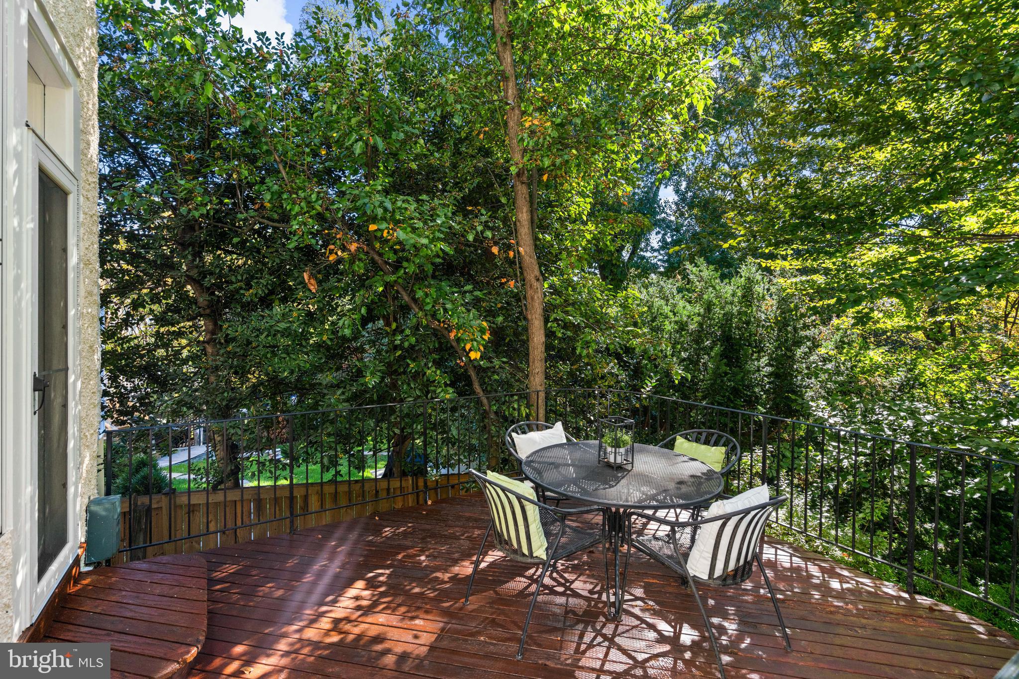 3214 Newark Street Northwest Washington, DC 20008 - Photo 34 of 38 a view of a table and chairs in the patio
