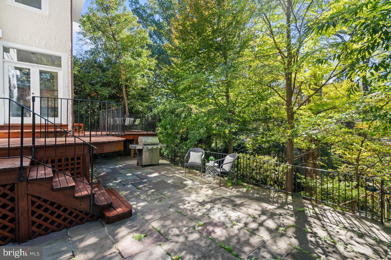 3214 Newark Street Northwest Washington, DC 20008 - Photo 36 of 38 a view of a patio with chairs and potted plants