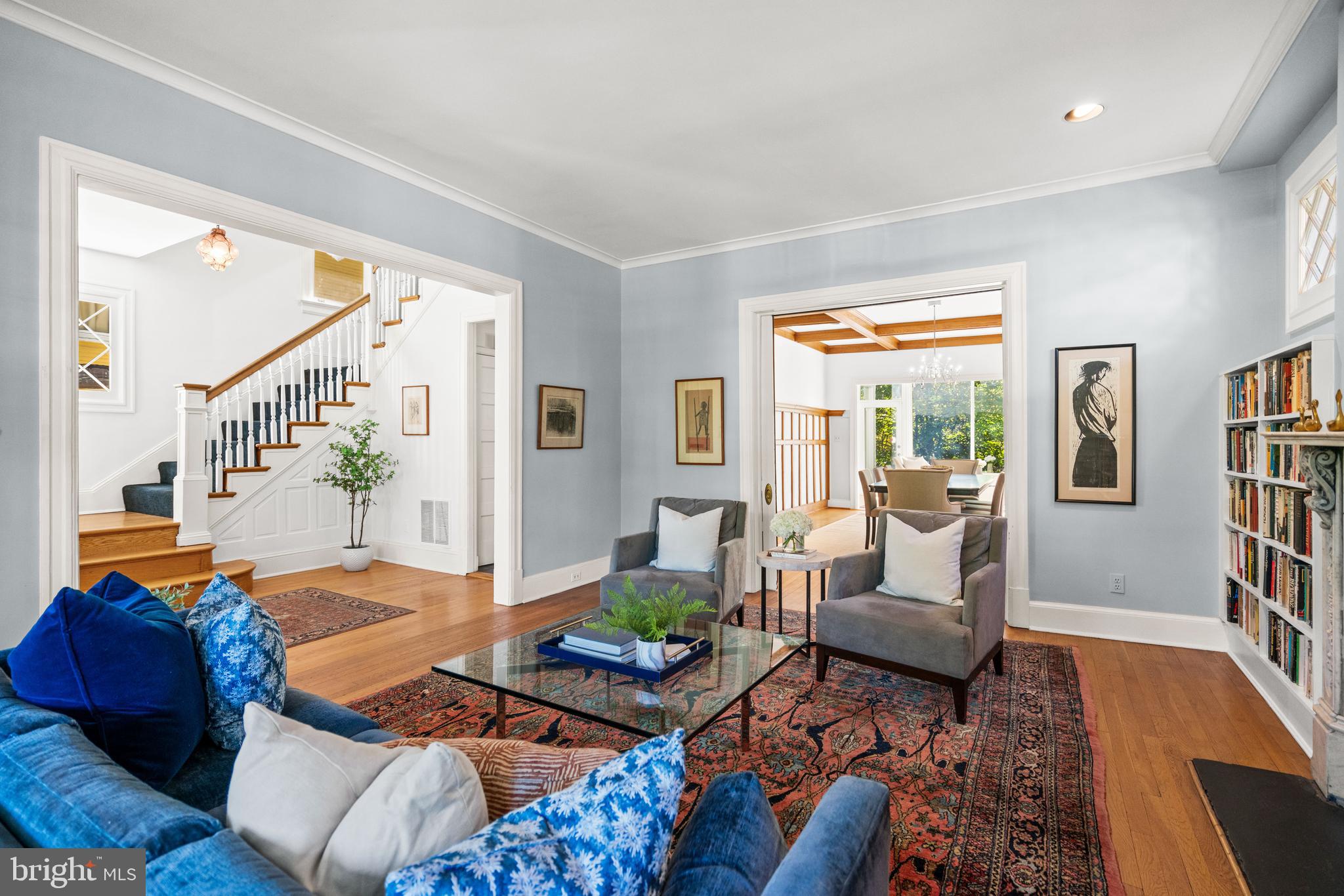 3214 Newark Street Northwest Washington, DC 20008 - Photo 5 of 38 a living room with furniture and a book shelf