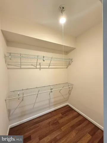 a view of a room with racks on the wall