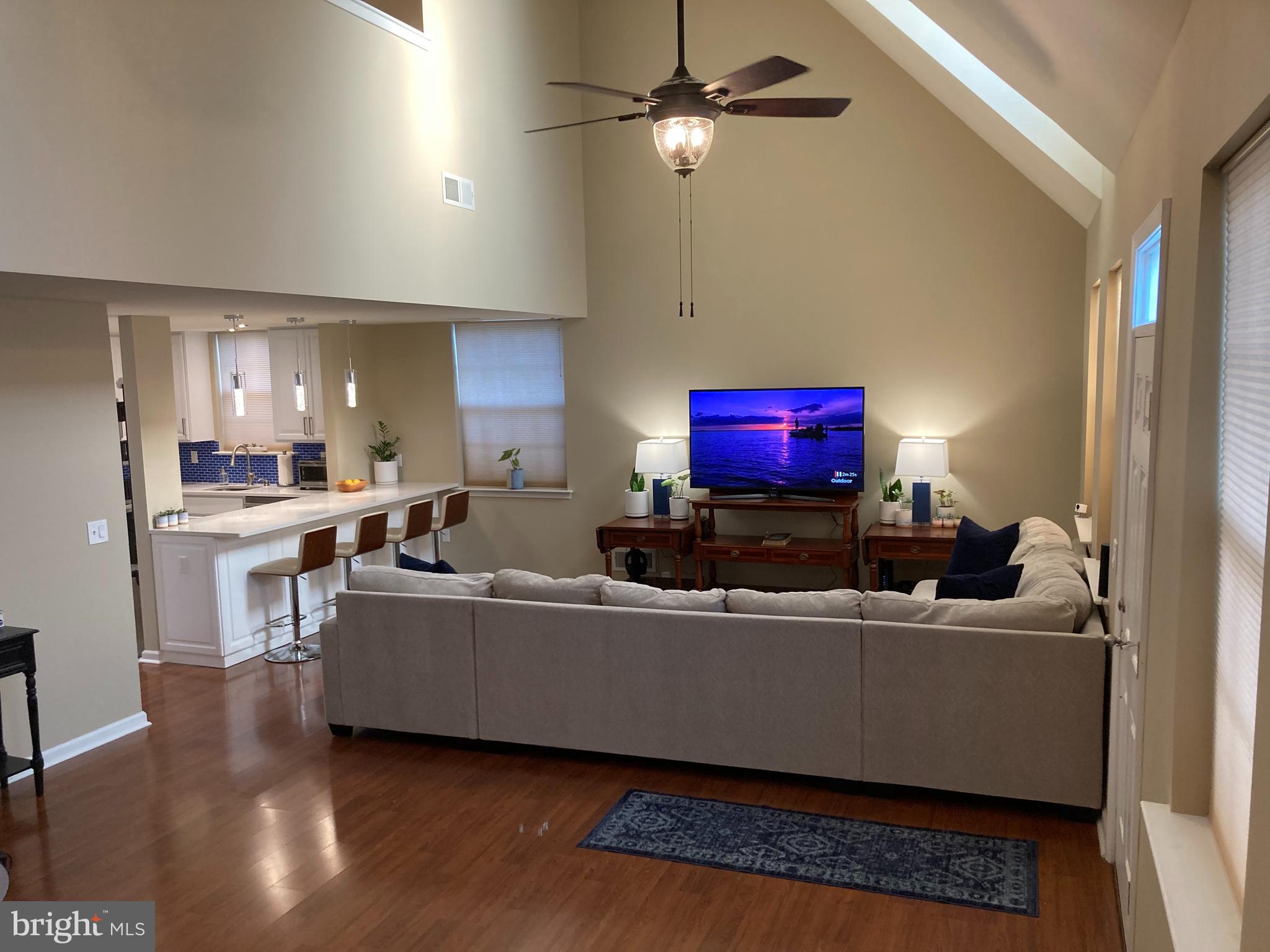 306 Ohio Avenue Wilmington, DE 19805 - Photo 8 of 13 a living room with furniture and a flat screen tv