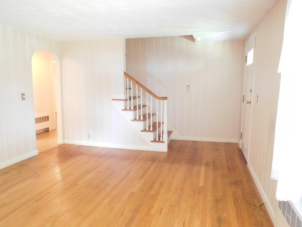 30 Elizabeth Street Springfield, MA 01109 - Photo 8 of 19 a view of an empty room with wooden floor