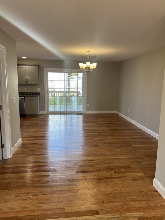 44 Downing Street Fall River, MA 02723 - Photo 3 of 10 a view of empty room with wooden floor