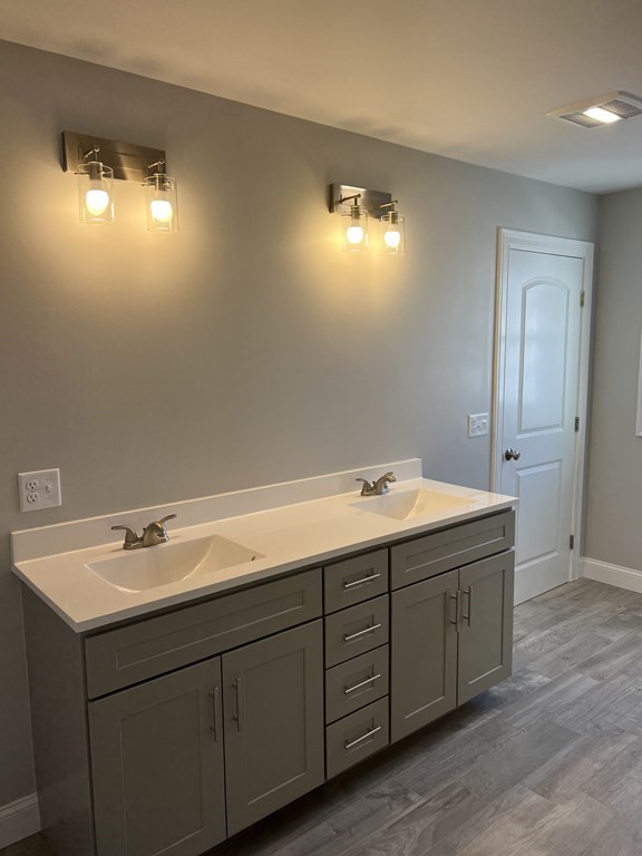 44 Downing Street Fall River, MA 02723 - Photo 8 of 10 a bathroom with a sink and mirror