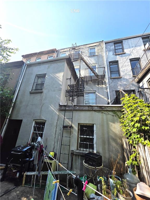 408 Madison Street Brooklyn, NY 11221 - Photo 4 of 17 a view of a house with a patio